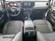 2024 Jeep Wrangler Sport S с VIN 1C4PJXDG8RW244260, выставлен на аукционе Copart как лот 84005155 с пробегом Не указан миль и Списание • Salvage title. История ставок и продаж доступна на DreamBid. Изображение 8.