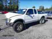 2000 Toyota Tacoma with VIN 5TEWM72N9YZ709411, listed as a IAAI auction lot 43417590 with 249,085 mi miles and . Bid and sale history available at DreamBid. Image 2.