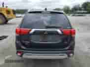2020 Mitsubishi Outlander ES z VIN JA4AZ3A31LZ020921, wystawiony jako Copart lot #67187745 z przebiegiem 63 784 mil mil oraz Szkoda całkowita • Salvage title. Historia ofert i sprzedaży dostępna na DreamBid. Obrazek 6.