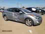 2013 Hyundai Elantra GLS with VIN KMHDH4AE8DU902823, listed as a Copart auction lot 81783065 with 151,980 mi miles and Salvage title. Bid and sale history available at DreamBid. Image 4.