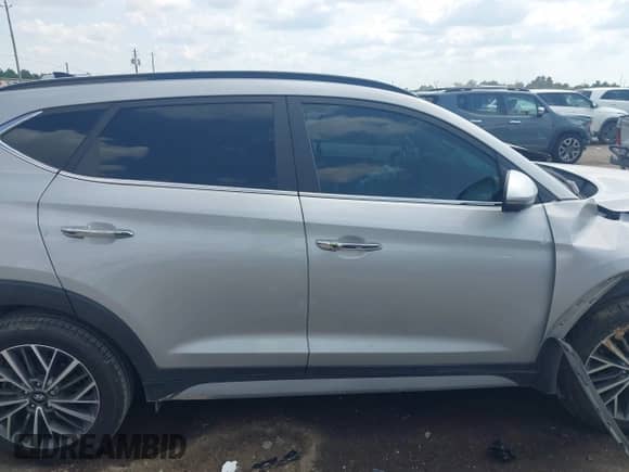 2021 Hyundai Tucson SEL with VIN KM8J33AL7MU355120, listed as a IAAI auction lot 43163333 with 27,602 mi miles and . Bid and sale history available at DreamBid. Image 12.