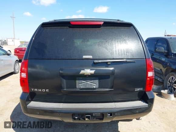 2009 Chevrolet Tahoe 2LT z VIN 1GNFK23079R294962, wystawiony jako IAAI lot #43303522 z przebiegiem 191 673 mil mil oraz . Historia ofert i sprzedaży dostępna na DreamBid. Obrazek 16.