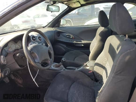 2001 Hyundai Tiburon с VIN KMHJG25F11U261457, выставлен на аукционе Copart как лот 43012635 с пробегом 165 625 миль миль и Списание • Salvage title. История ставок и продаж доступна на DreamBid. Изображение 7.