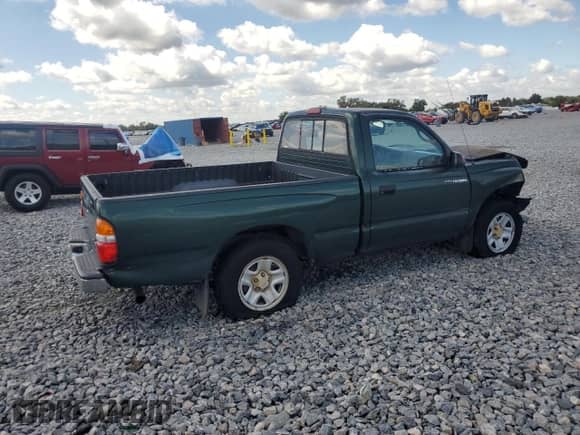 2002 Toyota Tacoma с VIN 5TENL42NX2Z025973, выставлен на аукционе Copart как лот 84580115 с пробегом 289 670 миль миль и Списание • Salvage title. История ставок и продаж доступна на DreamBid. Изображение 3.