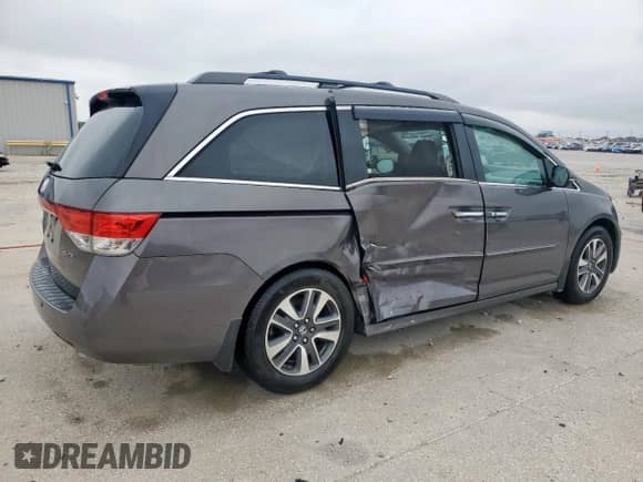 2015 Honda Odyssey Touring Elite с VIN 5FNRL5H96FB082857, выставлен на аукционе Copart как лот 59637105 с пробегом 187 947 миль миль и Списание • Salvage title. История ставок и продаж доступна на DreamBid. Изображение 3.