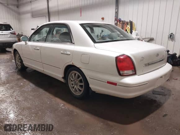 2002 Hyundai XG L z VIN KMHFU45EX2A180204, wystawiony jako IAAI lot #41472564 z przebiegiem 148 333 mil mil oraz . Historia ofert i sprzedaży dostępna na DreamBid. Obrazek 3.