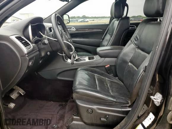 2016 Jeep Grand Cherokee High Altitude with VIN 1C4RJECG0GC501425, listed as a Copart auction lot 71906785 with 217,476 mi miles and Salvage title. Bid and sale history available at DreamBid. Image 7.