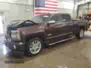 2016 Chevrolet Silverado 1500 High Country z VIN 3GCUKTEC5GG225522, wystawiony jako Copart lot #80752065 z przebiegiem 132 289 mil mil oraz Czysty tytuł • Clean title. Historia ofert i sprzedaży dostępna na DreamBid. Obrazek 1.