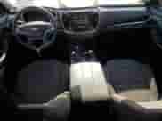 2018 Chevrolet Traverse LS with VIN 1GNEVLKW2JJ113025, listed as a Copart auction lot 65220875 with 144,511 mi miles and Salvage title. Bid and sale history available at DreamBid. Image 8.