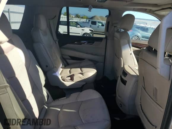2015 Cadillac Escalade Premium z VIN 1GYS3CKJ3FR239886, wystawiony jako Copart lot #84994395 z przebiegiem 65 701 mil mil oraz Szkoda całkowita • Salvage title. Historia ofert i sprzedaży dostępna na DreamBid. Obrazek 11.