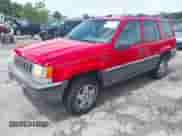1994 Jeep Grand Cherokee Laredo with VIN 1J4GZ58YXRC168746, listed as a IAAI auction lot 42595739 with 224,039 mi miles and . Bid and sale history available at DreamBid. Image 2.