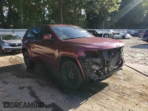 2019 Jeep Grand Cherokee Altitude with VIN 1C4RJEAG1KC596637, listed as a Copart auction lot 66207265 with 90,658 mi miles and Salvage title. Bid and sale history available at DreamBid. Image 14.