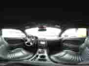 2009 Dodge Challenger R/T z VIN 2B3LJ54T09H563037, wystawiony jako IAAI lot #43288315 z przebiegiem 190 806 mil mil oraz . Historia ofert i sprzedaży dostępna na DreamBid. Obrazek 19.