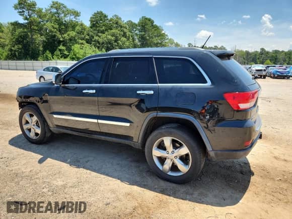 2012 Jeep Grand Cherokee Overland with VIN 1C4RJFCT9CC346497, listed as a Copart auction lot 63004635 with 142,623 mi miles and Salvage title. Bid and sale history available at DreamBid. Image 2.