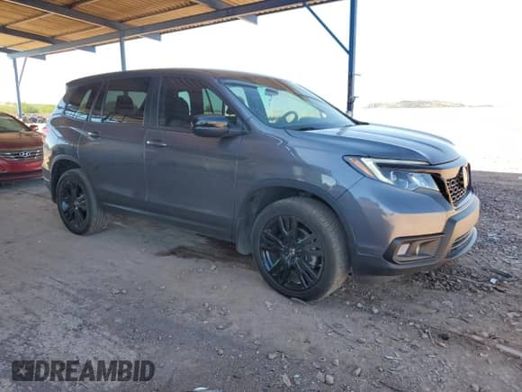 2021 Honda Passport Sport with VIN 5FNYF8H24MB016666, listed as a Copart auction lot 81897105 with 51,957 mi miles and Salvage title. Bid and sale history available at DreamBid. Image 4.
