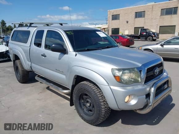 2011 Toyota Tacoma z VIN 5TFUU4EN7BX007149, wystawiony jako IAAI lot #40732059 z przebiegiem 96 347 mil mil oraz . Historia ofert i sprzedaży dostępna na DreamBid. Obrazek 1.