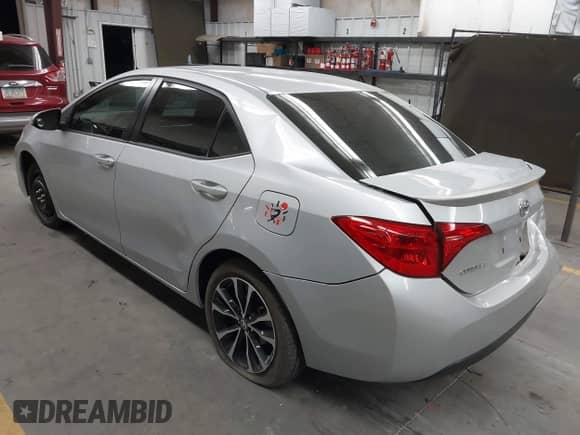 2019 Toyota Corolla L with VIN 2T1BURHE2KC194542, listed as a IAAI auction lot 42853754 with 99,110 mi miles and . Bid and sale history available at DreamBid. Image 3.