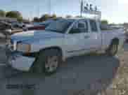 2005 Dodge Dakota with VIN 1D7HW52N65S257043, listed as a Copart auction lot 74013574 with 187,829 mi miles and Salvage title. Bid and sale history available at DreamBid. Image 1.