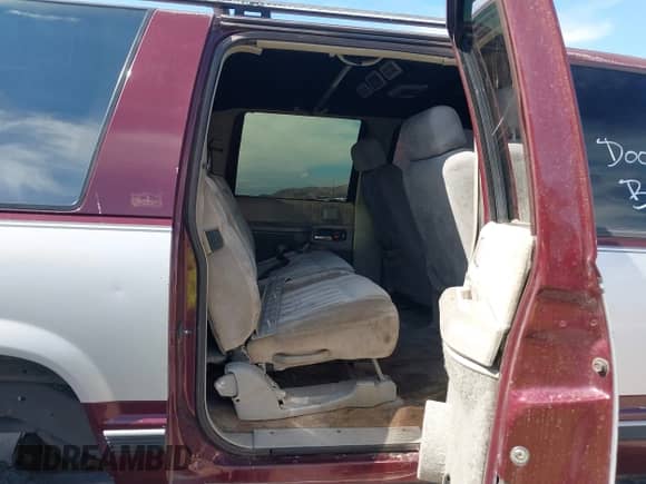 1994 Chevrolet Suburban with VIN 1GNFK16K2RJ325458, listed as a IAAI auction lot 42656074 with 244,166 mi miles and . Bid and sale history available at DreamBid. Image 8.