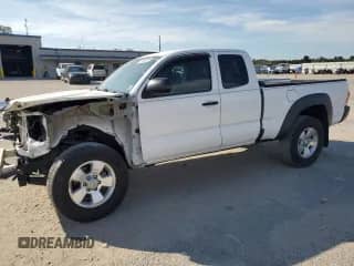 2015 Toyota Tacoma with VIN 5TFUX4EN3FX034765, listed as a Copart auction lot 71669305 with 124,290 mi miles and Salvage title. Bid and sale history available at DreamBid. Image 1.