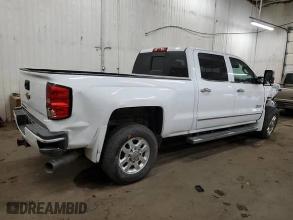 2015 Chevrolet Silverado 3500HD LTZ с VIN 1GC4K0E80FF599384, выставлен на аукционе Copart как лот 76975984 с пробегом 73 351 миль миль и Списание • Salvage title. История ставок и продаж доступна на DreamBid. Изображение 3.