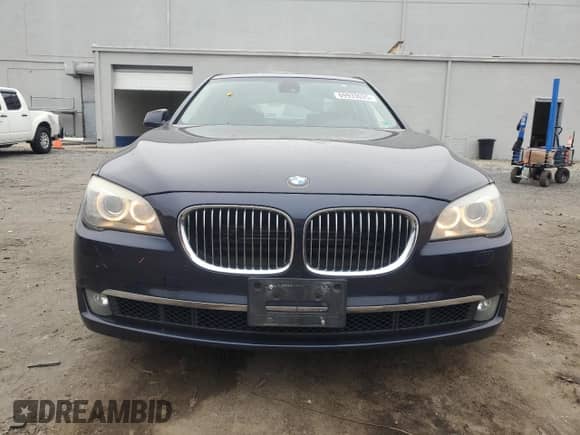 2012 BMW 7 Series 750i xDrive with VIN WBAKC6C52CDX99493, listed as a Copart auction lot 69933035 with 117,809 mi miles and Salvage title. Bid and sale history available at DreamBid. Image 5.