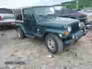 1999 Jeep Wrangler Sahara z VIN 1J4FY49S5XP482037, wystawiony jako IAAI lot #42341723 z przebiegiem 161 081 mil mil oraz . Historia ofert i sprzedaży dostępna na DreamBid. Obrazek 1.