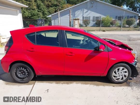 2015 Toyota Prius One z VIN JTDKDTB31F1582909, wystawiony jako IAAI lot #43178125 z przebiegiem 99 824 mil mil oraz . Historia ofert i sprzedaży dostępna na DreamBid. Obrazek 14.