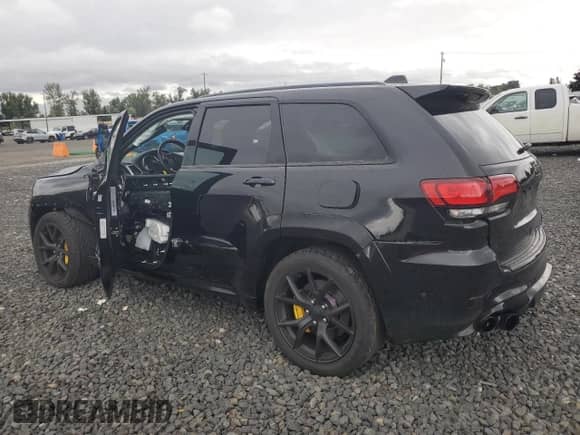 2018 Jeep Grand Cherokee Trackhawk with VIN 1C4RJFN90JC397921, listed as a Copart auction lot 68282005 with 70,720 mi miles and Salvage title. Bid and sale history available at DreamBid. Image 2.