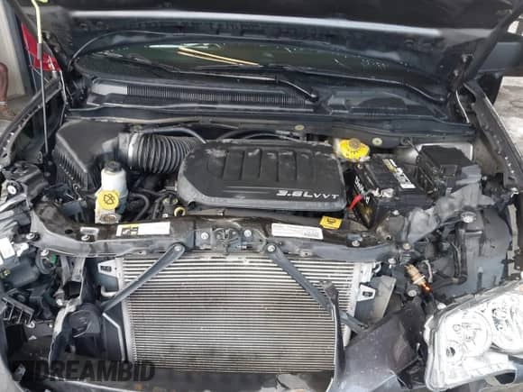 2015 Dodge Grand Caravan SE с VIN 2C4RDGBG5FR670558, выставлен на аукционе IAAI как лот 42698463 с пробегом 70 449 миль миль и . История ставок и продаж доступна на DreamBid. Изображение 10.