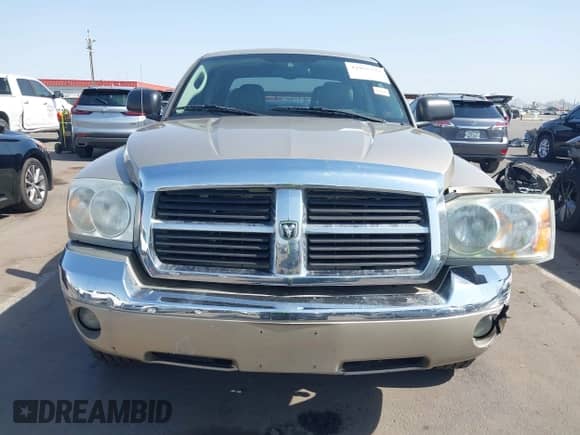 2005 Dodge Dakota with VIN 1D3HW58N85S205244, listed as a IAAI auction lot 42955372 with 200,581 mi miles and . Bid and sale history available at DreamBid. Image 12.
