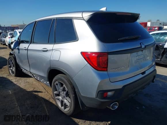 2023 Honda Passport EX-L with VIN 5FNYF8H50PB036640, listed as a IAAI auction lot 42536022 with 1,658 mi miles and . Bid and sale history available at DreamBid. Image 3.