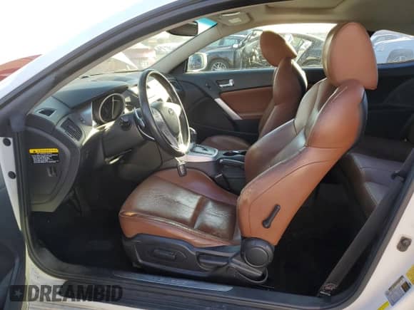 2010 Hyundai Genesis Coupe Grand Touring z VIN KMHHU6KH0AU042137, wystawiony jako Copart lot #84340015 z przebiegiem 58 816 mil mil oraz Szkoda całkowita • Salvage title. Historia ofert i sprzedaży dostępna na DreamBid. Obrazek 7.