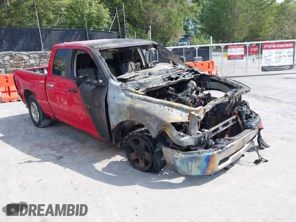 2011 Ram 1500 Lone Star with VIN 1D7RV1GP1BS518035, listed as a IAAI auction lot 43157823 with 216,220 mi miles and . Bid and sale history available at DreamBid. Image 1.