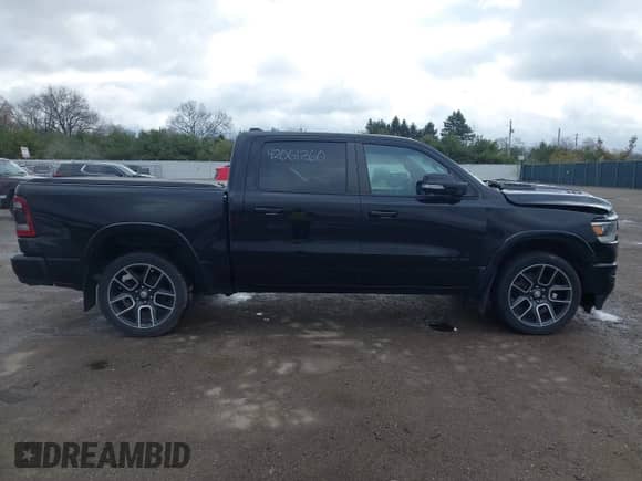 2019 Ram 1500 Laramie z VIN 1C6SRFJTXKN589601, wystawiony jako IAAI lot #42061260 z przebiegiem 109 901 mil mil oraz . Historia ofert i sprzedaży dostępna na DreamBid. Obrazek 13.