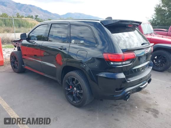 2016 Jeep Grand Cherokee SRT with VIN 1C4RJFDJ7GC399461, listed as a IAAI auction lot 43320500 with 97,123 mi miles and . Bid and sale history available at DreamBid. Image 3.