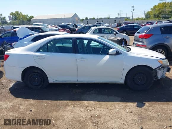 2013 Toyota Camry L with VIN 4T4BF1FKXDR317127, listed as a IAAI auction lot 43162373 with 158,925 mi miles and . Bid and sale history available at DreamBid. Image 14.
