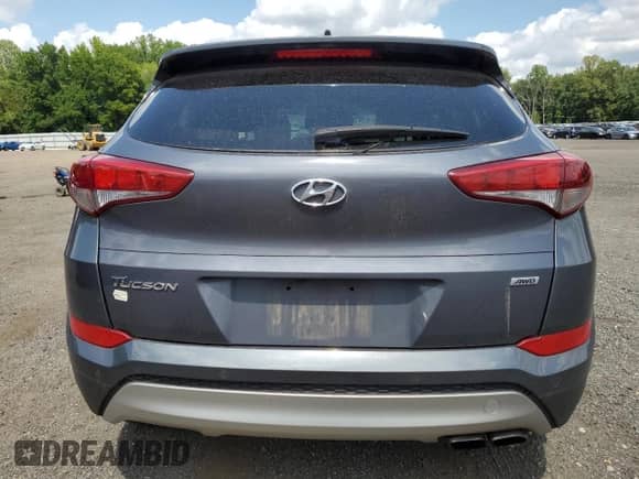 2018 Hyundai Tucson Limited with VIN KM8J3CA24JU719951, listed as a Copart auction lot 68321695 with 145,301 mi miles and Salvage title. Bid and sale history available at DreamBid. Image 6.