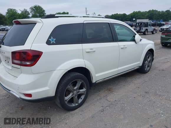 2015 Dodge Journey Crossroad with VIN 3C4PDCGB3FT713482, listed as a IAAI auction lot 42593334 with 136,020 mi miles and . Bid and sale history available at DreamBid. Image 4.