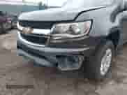 2015 Chevrolet Colorado 2WD LT z VIN 1GCGSBEA2F1217266, wystawiony jako IAAI lot #43018654 z przebiegiem 150 116 mil mil oraz . Historia ofert i sprzedaży dostępna na DreamBid. Obrazek 6.
