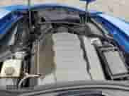 2014 Chevrolet Corvette 2LT z VIN 1G1YD2D76E5106059, wystawiony jako Copart lot #54941684 z przebiegiem 39 254 mil mil oraz Szkoda całkowita • Salvage title. Historia ofert i sprzedaży dostępna na DreamBid. Obrazek 11.