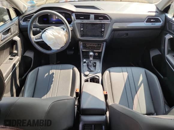 2023 Volkswagen Tiguan SE с VIN 3VV2B7AX1PM020273, выставлен на аукционе Copart как лот 65806945 с пробегом 23 262 миль миль и Списание • Salvage title. История ставок и продаж доступна на DreamBid. Изображение 8.