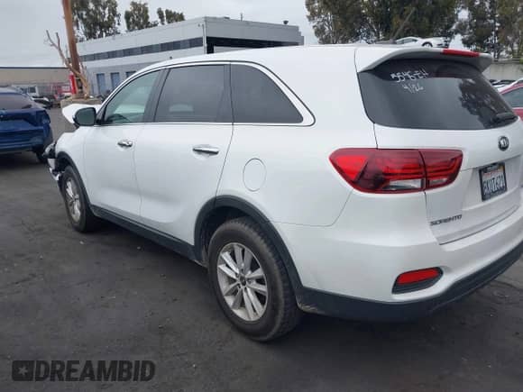 2019 Kia Sorento L with VIN 5XYPG4A3XKG536087, listed as a IAAI auction lot 42180549 with 103,758 mi miles and . Bid and sale history available at DreamBid. Image 3.