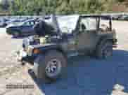 2002 Jeep Wrangler X z VIN 1J4FA39S12P776350, wystawiony jako Copart lot #82276415 z przebiegiem 196 023 mil mil oraz Szkoda całkowita • Salvage title. Historia ofert i sprzedaży dostępna na DreamBid. Obrazek 1.