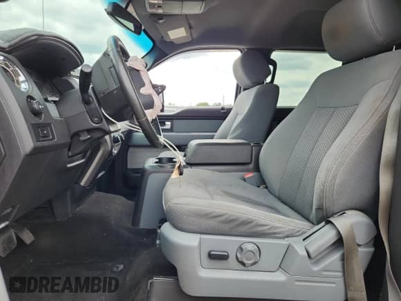 2012 Ford F-150 XL with VIN 1FTFW1ET2CFC52237, listed as a Copart auction lot 71601075 with 185,445 mi miles and Salvage title. Bid and sale history available at DreamBid. Image 7.