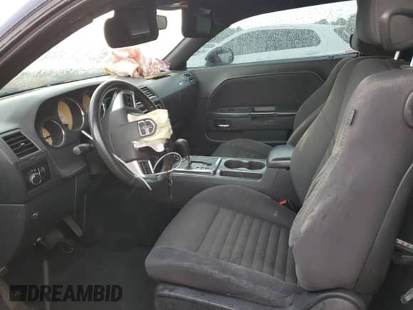 2013 Dodge Challenger SXT z VIN 2C3CDYAG7DH676527, wystawiony jako Copart lot #66930415 z przebiegiem 170 584 mil mil oraz Szkoda całkowita • Salvage title. Historia ofert i sprzedaży dostępna na DreamBid. Obrazek 7.