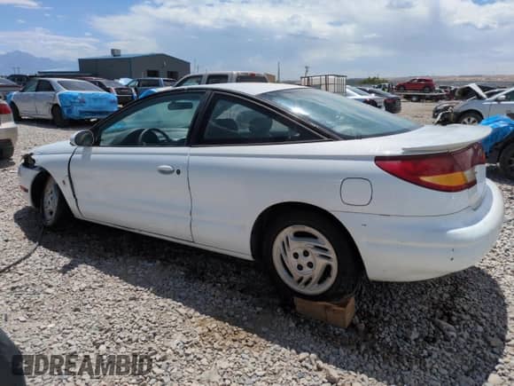 1997 Saturn SC с VIN 1G8ZG1273VZ138180, выставлен на аукционе Copart как лот 63857415 с пробегом 122 513 миль миль и Списание • Salvage title. История ставок и продаж доступна на DreamBid. Изображение 2.