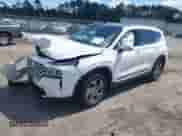 2023 Hyundai Santa Fe SEL with VIN 5NMS34AJ0PH636636, listed as a IAAI auction lot 43206173 with 16,736 mi miles and . Bid and sale history available at DreamBid. Image 2.