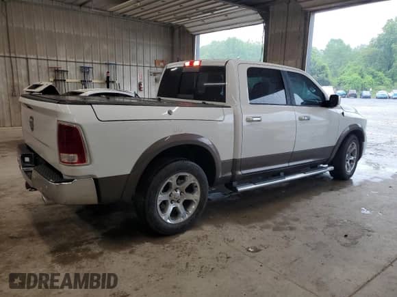 2017 Ram 1500 Laramie with VIN 1C6RR6NT7HS781965, listed as a Copart auction lot 56574875 with 130,209 mi miles and Salvage title. Bid and sale history available at DreamBid. Image 3.