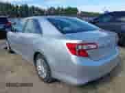 2014 Toyota Camry XLE with VIN 4T4BF1FKXER444817, listed as a IAAI auction lot 43456924 with 107,008 mi miles and . Bid and sale history available at DreamBid. Image 3.